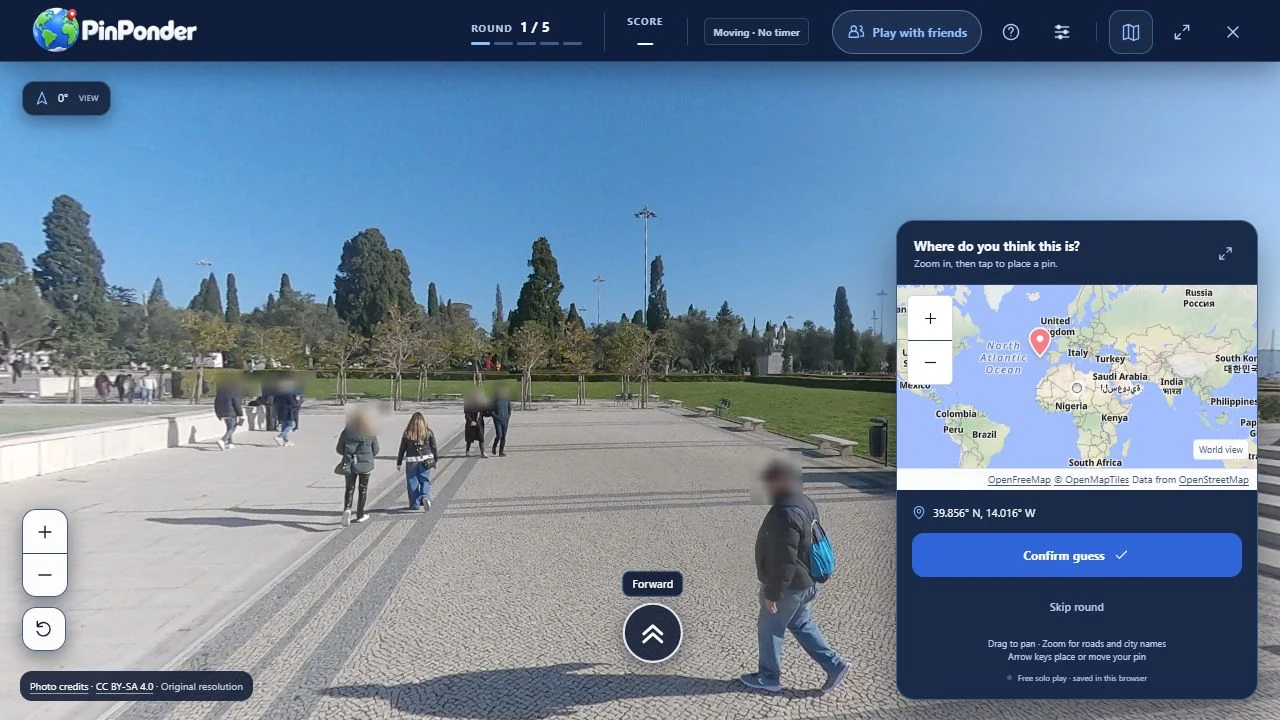 A solo PinPonder round in progress: a real photograph of a sunny park promenade with young trees, lawns and pedestrians walking a paved esplanade, a Forward movement arrow on the paving, the compact guess map with a pin already placed beside it, and the game header showing Moving mode with no timer set.